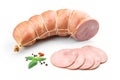 Stick of boiled pork sausage, sliced smoked ham, gammon with spices and fresh herbs isolated on white background Royalty Free Stock Photo