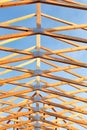 The pattern of the eaves and trusses on a stick built home