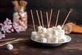 Stick delicious puffy marshmallows toasted. Generate Ai