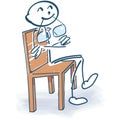 Stick figure on a chair thinking Royalty Free Stock Photo