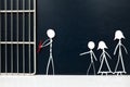 Stick figure father handcuffed tied with red rope going to a jail prison with sad family on the side in dark background. Royalty Free Stock Photo