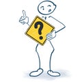 Stick figure with a sign with a question mark in front Royalty Free Stock Photo
