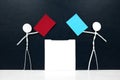 Stick man figure holding red and blue paper ballot beside a vote box. US presidential election democrat versus republican. Royalty Free Stock Photo