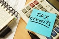 Stick with words tax credits. Royalty Free Stock Photo