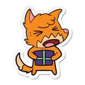 sticker of a angry cartoon fox with christmas present