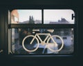 Sticker of a bike on a train window