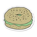 sticker of a cartoon bagel