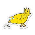 sticker of a cartoon bird pecking seeds