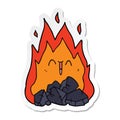 sticker of a cartoon blazing coal fire