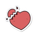 sticker of a cartoon broken heart