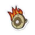 sticker of a cartoon burning shield