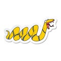 sticker of a cartoon crawling snake