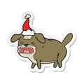 sticker cartoon of a dog barking wearing santa hat