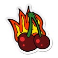 sticker of a cartoon flaming cherries