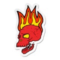 sticker of a cartoon flaming skull