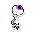 sticker of a cartoon gross eyeball