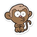 sticker of a cartoon hooting monkey