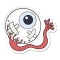 sticker of a cartoon injured eyeball