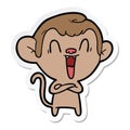 sticker of a cartoon laughing monkey