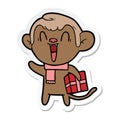 sticker of a cartoon laughing monkey