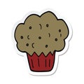 sticker of a cartoon muffin