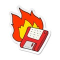 sticker of a cartoon old computer disk burning Royalty Free Stock Photo