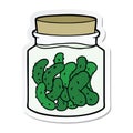 sticker of a cartoon pickled gherkins