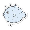 sticker of a cartoon puffer fish