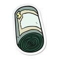 sticker of a cartoon roll of money