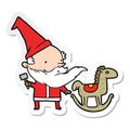 sticker of a cartoon santa making toy