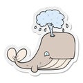 sticker of a cartoon whale spouting water