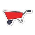 sticker of a cartoon wheelbarrow