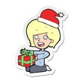 sticker of a cartoon woman opening presents