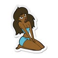 sticker of a cartoon woman in skimpy clothing