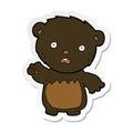 sticker of a cartoon worried black bear