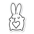 sticker of a cute cartoon rabbit with love heart Royalty Free Stock Photo