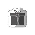 sticker grayscale silhouette with giftbox with ribbon