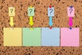 A sticker with a question mark is attached to the cork board. Empty stickers for copy space