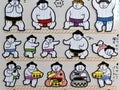 A sticker showing Japanese rikishi or sumo wrestlers Royalty Free Stock Photo