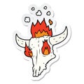 sticker of a spooky flaming animals skull cartoon Royalty Free Stock Photo