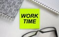 Sticker with text Work Time notepad and eyeglasses. Here can be your text Royalty Free Stock Photo