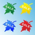 Stickers with seasonal sales in the form of colorful maple leaves, the concept of seasonal discounts and doing business Royalty Free Stock Photo