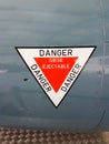 Stickers sign on plane write in french siÃÂ¨ge ÃÂ©jectable danger means ejection seat danger