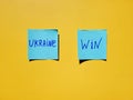 Stickers with words on yellow background close up. Flat lay. Concept of freedom and support Ukraine. Protest action. Stop war Royalty Free Stock Photo