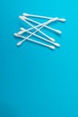 Sticks for cleaning ears on a blue background Royalty Free Stock Photo