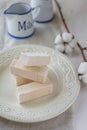 Sticks of marshmallow on a light background Royalty Free Stock Photo