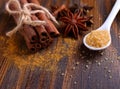 Sticks and powder of cinnamon, anise, sugar cane Royalty Free Stock Photo