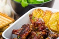 Sticky chicken wings with garlic panini bread