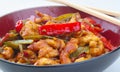 Sticky lemon chicken with peppers and mange tout Royalty Free Stock Photo