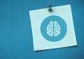 Sticky Note with brain Icon against neutral blue background Royalty Free Stock Photo